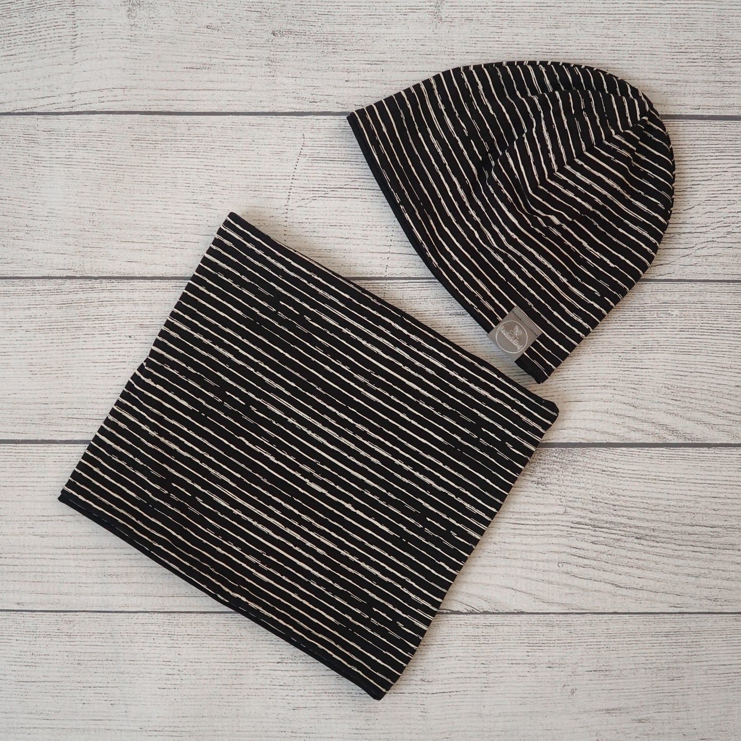 Wende Beanie - Schwarz gestreift